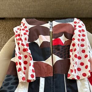 Colorful Patterned jacket with Red and Brown Accents